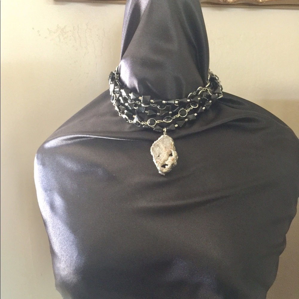 Black choker with natural stone.